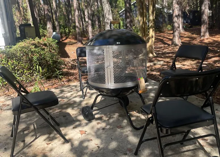 Pet Friendly Cottage Nestled In The Pines With Cozy Fire Pit Only Minutes To Beaches